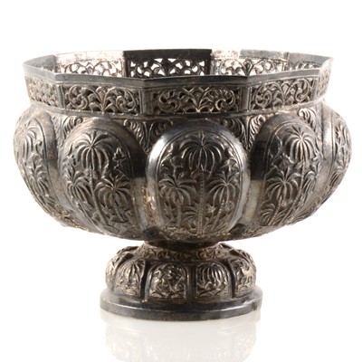 Lot 277 - A white metal bowl comprising ten panels depicting elephants, trees and other animals.