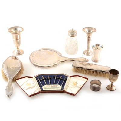 Lot 291 - A quantity of silver, to include a dressing table set, double jigger, spill vases, napkin rings etc.