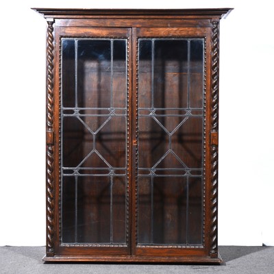 Lot 579 - 1930's oak glazed bookcase