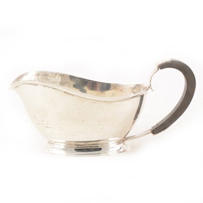 Lot 270 - A silver sauce boat possibly by S Blanckensee & Son Ltd, Chester 1938.