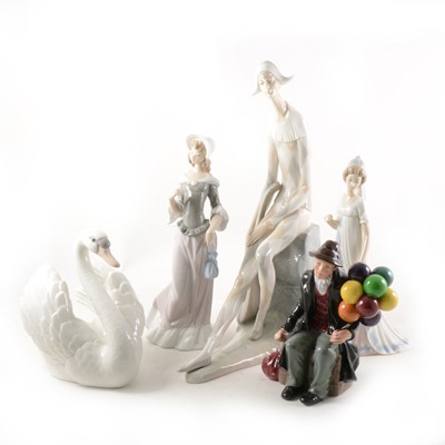 Lot 66 - A collection of Lladro figurines, a large Nao fisherman, etc
