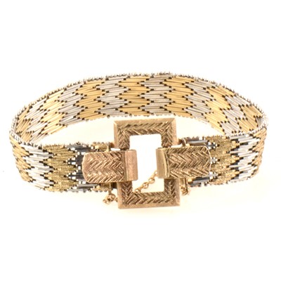 Lot 367 - A 9 carat yellow and white gold buckle design bracelet.