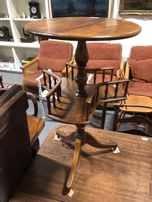 Lot 555 - A mahogany pedestal wine table with galleried underier.