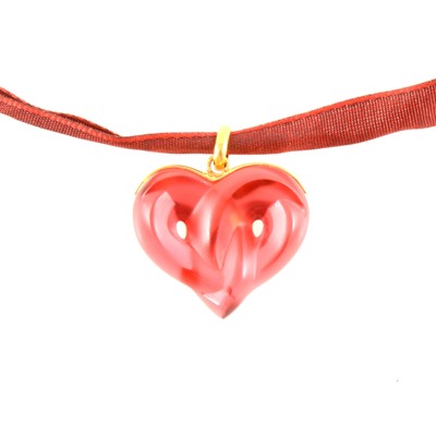 Lot 398 - Lalique - A "Coeurs Entrelacs" red glass entwined double heart pendant