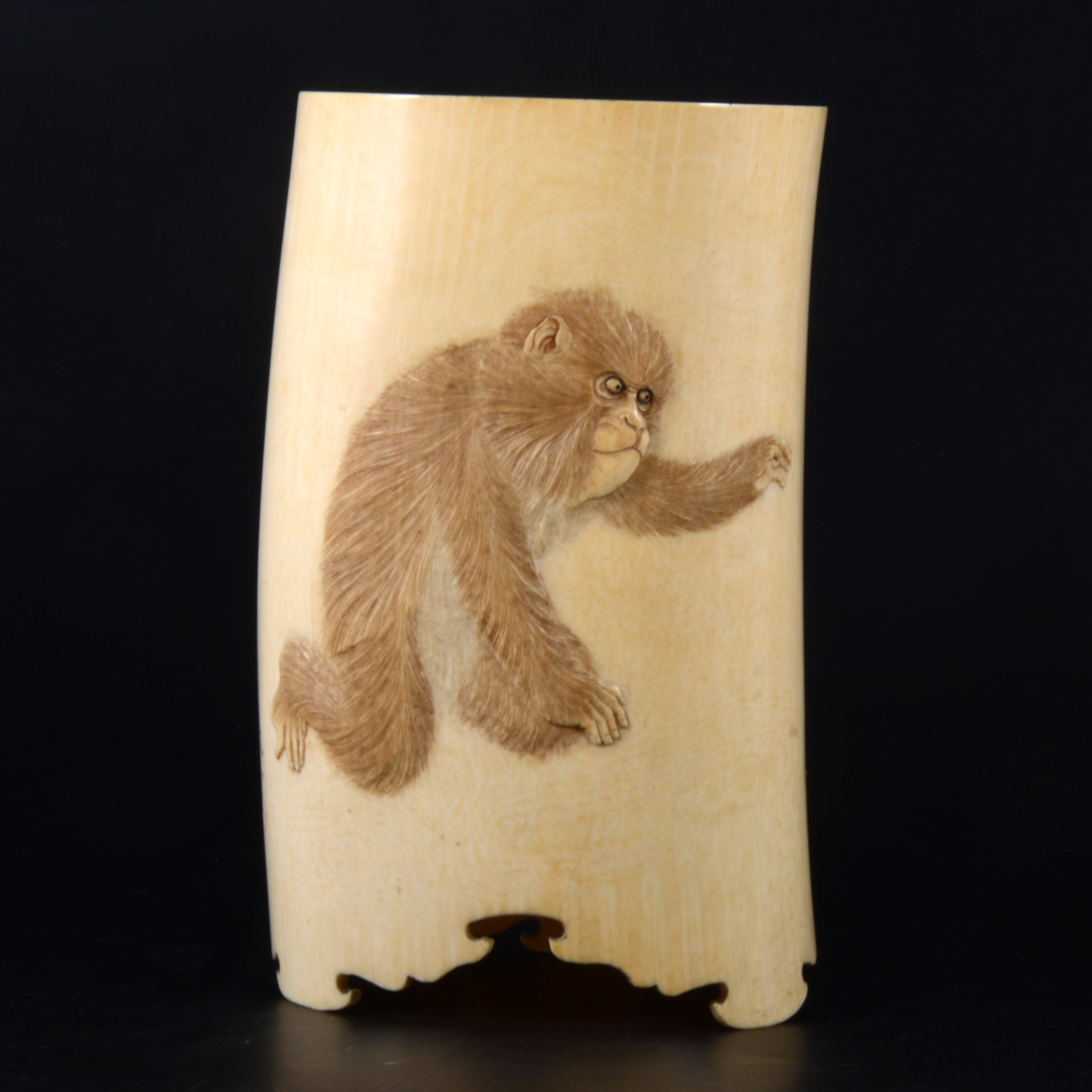 Lot 34 A Japanese carved ivory brush holder, Meiji