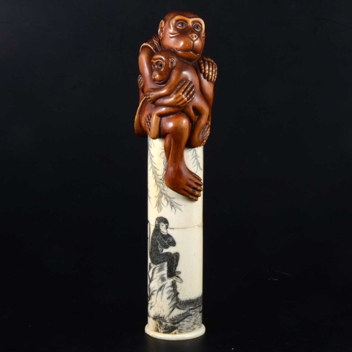 Lot 36 - A Japanese carved bone and stained wood scroll case, early 20th Century