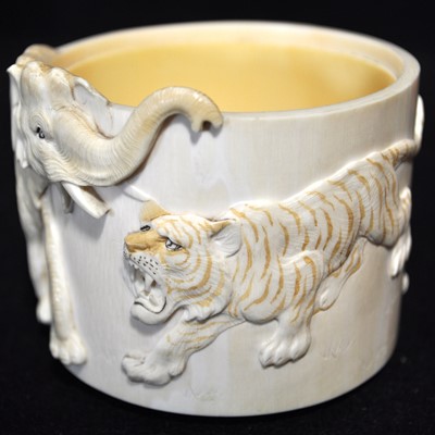 Lot 47 - A Japanese carved and stained ivory box, early 20th Century