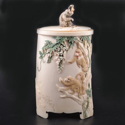 Lot 275 - A Japanese carved and stained ivory brush pot, Meiji