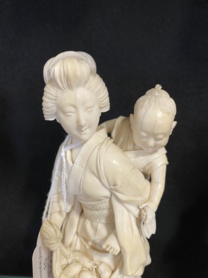 Lot 53 - A Japanese carved ivory okimono, Meiji