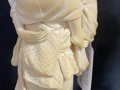 Lot 53 - A Japanese carved ivory okimono, Meiji