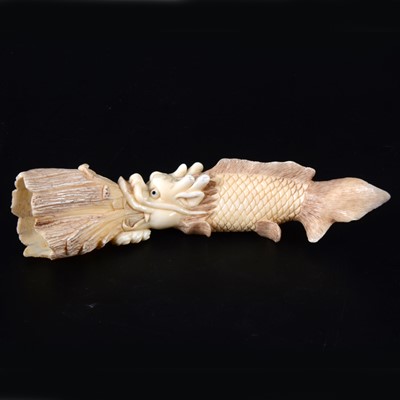 Lot 54 - A Japanese carved ivory okimono, early 20th Century