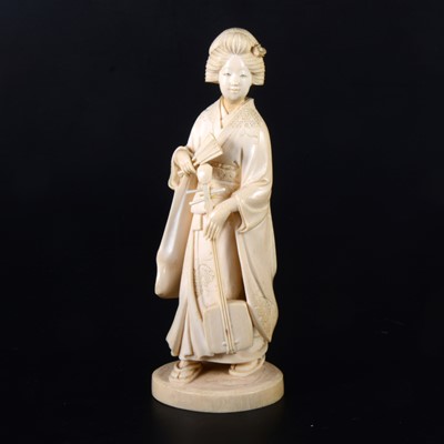 Lot 57 - A Japanese carved ivory okimono, probably Meiji