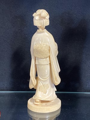Lot 57 - A Japanese carved ivory okimono, probably Meiji