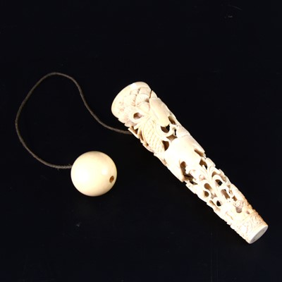 Lot 65 - A Cantonese carved ivory cup and ball game