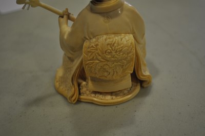 Lot 64 - A Japanese carved ivory okimono, Meiji