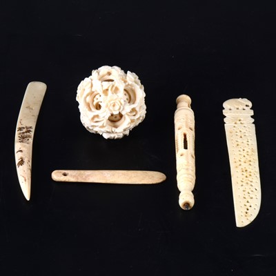 Lot 66 - A small Cantonese carved ivory puzzle ball, a carved bone propelling pencil, etc