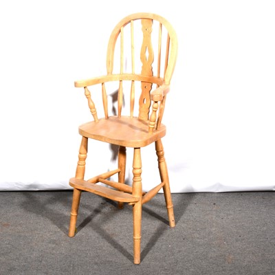 Lot 593 - A child's beechwood Windsor high chair