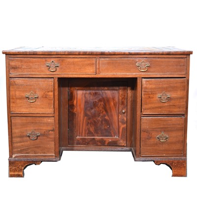 Lot 476 - Victorian mahogany kneehole desk.