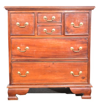 Lot 478 - Georgian style mahogany chest of drawers and a pair of matching bedside tables