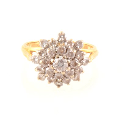 Lot 338 - A floral diamond cluster ring.