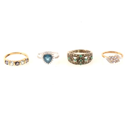 Lot 334 - Three 9 carat gold gemset dress rings and a silver ring.