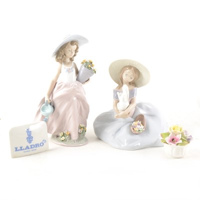 Lot 11 - Two Lladro figures, a retailer's plaque, and a Coalport floral posy.