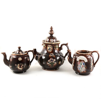 Lot 57 - Three Bargeware teapots