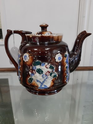 Lot 44 - Three items of Bargeware, including two teapots and a jug