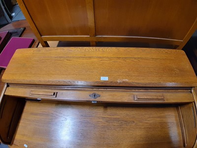 Lot 127 - An Edwardian oak rolltop desk, by Lebus.