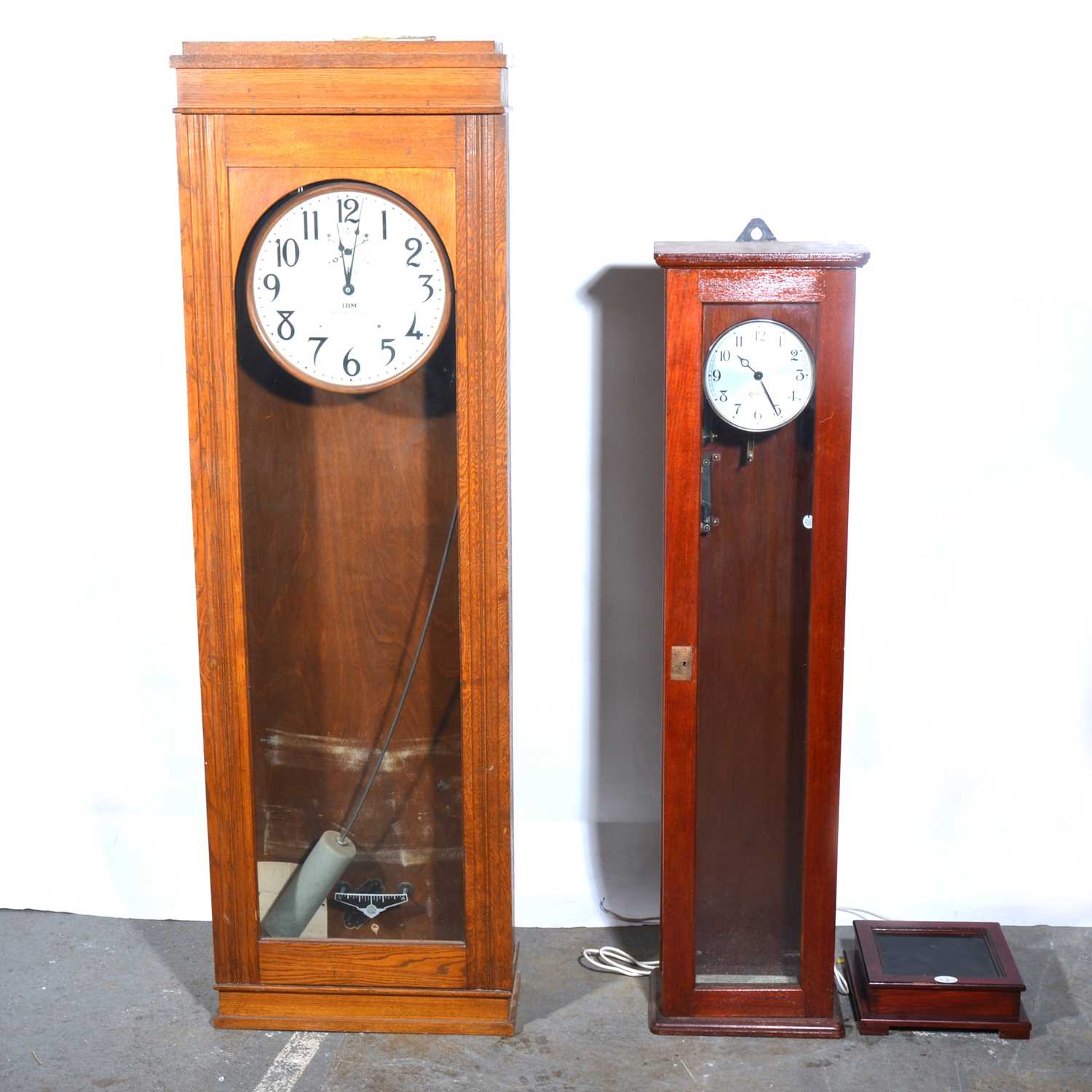 Lot 517 - An IBM International electric factory clock, and two other clocks