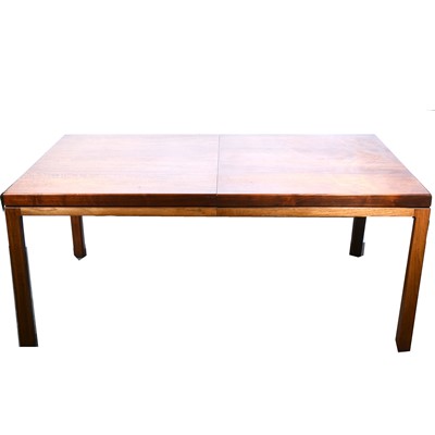 Lot 68 - A vintage teak extending dining table.