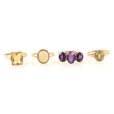 Lot 339 - Four 9 carat gold semi-precious gemset rings.