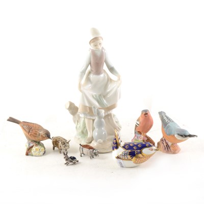 Lot 87 - A small collection of silver / plated pin cushions and ceramic figurines.