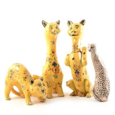 Lot 13 - Three Continental faience figures of cats, and another pottery model