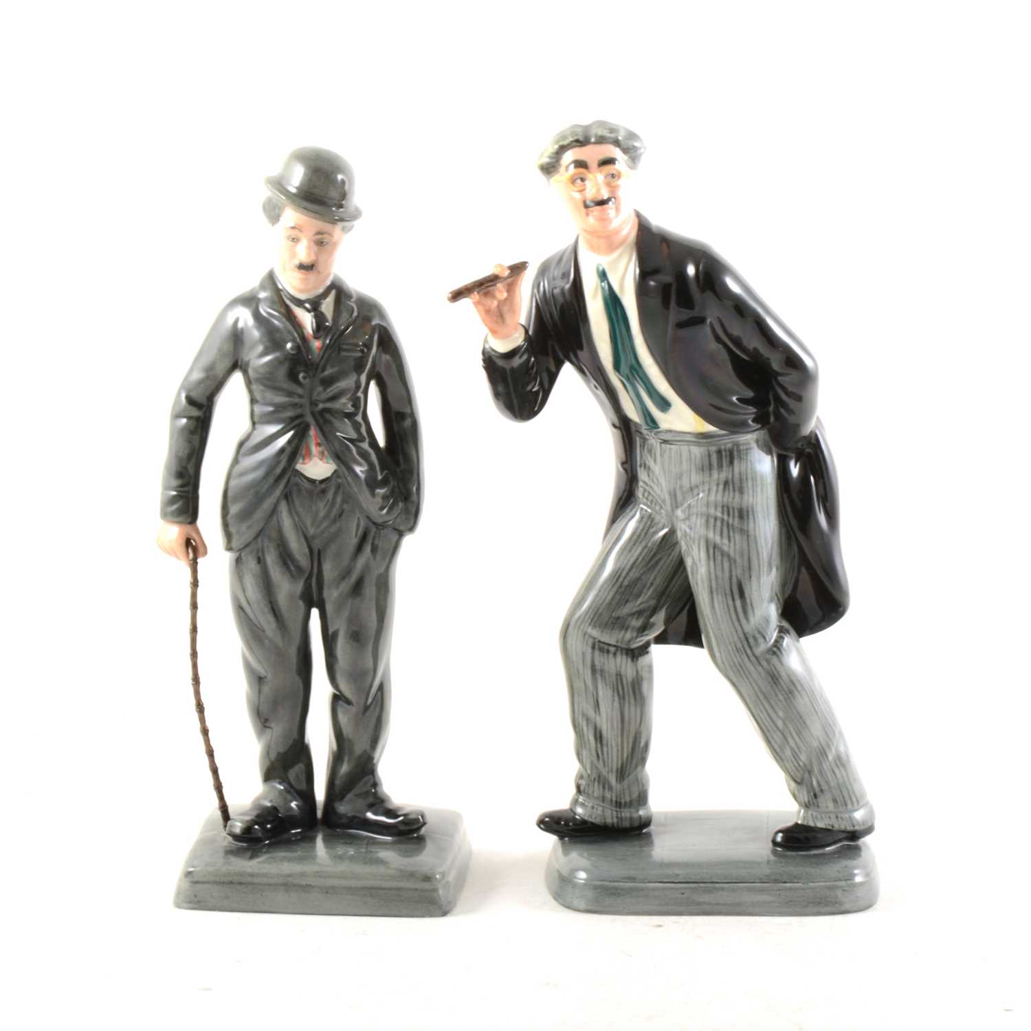 Lot 83 - Royal Doulton "Charlie Chaplin" and "Groucho Marx", limited edition figures.