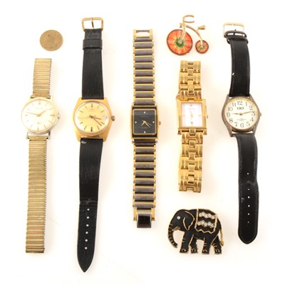 Lot 322 - A collection of costume jewellery and wrist watches, some odd gold earrings, silver coloured miniature purse, badges.