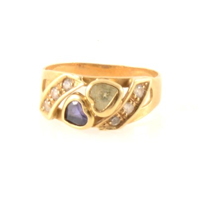 Lot 348 - A gemset dress ring marked 750.