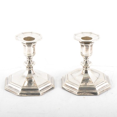 Lot 319 - Pair of Edwardian silver dwarf candlesticks