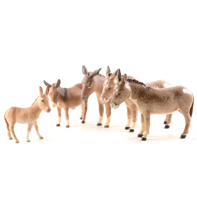 Lot 48 - Five Beswick donkey figurines