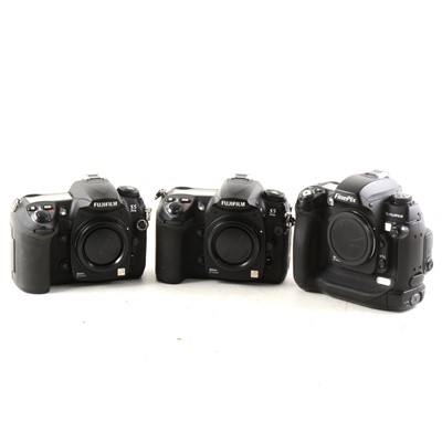 Lot 168 - Three digital SLR cameras; including Fujifilm...