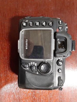 Lot 168 - Three digital SLR cameras; including Fujifilm...