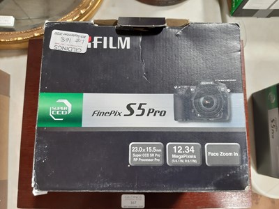 Lot 168 - Three digital SLR cameras; including Fujifilm...