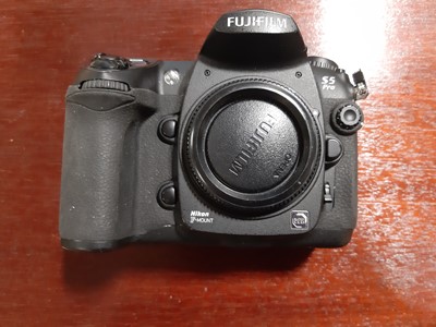Lot 168 - Three digital SLR cameras; including Fujifilm...