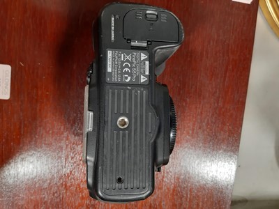 Lot 168 - Three digital SLR cameras; including Fujifilm...
