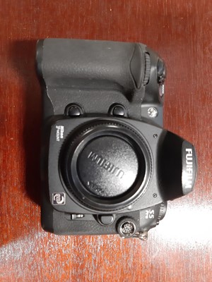Lot 168 - Three digital SLR cameras; including Fujifilm...