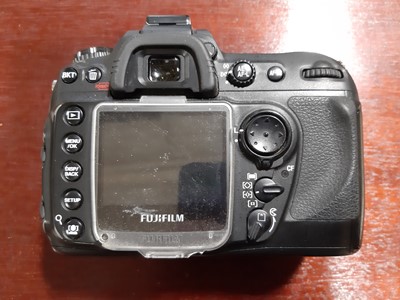 Lot 168 - Three digital SLR cameras; including Fujifilm...