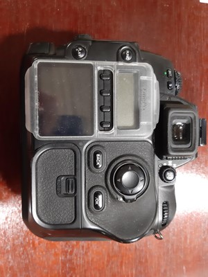 Lot 168 - Three digital SLR cameras; including Fujifilm...