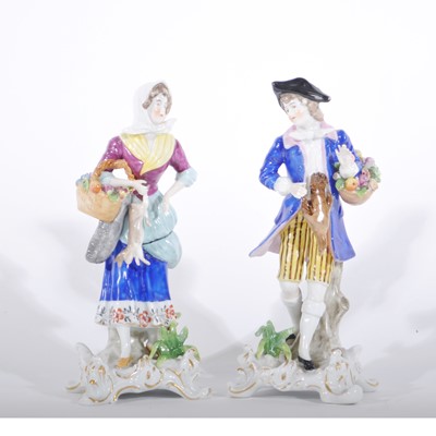Lot 29 - Pair of Continental porcelain figures, with game and flower baskets