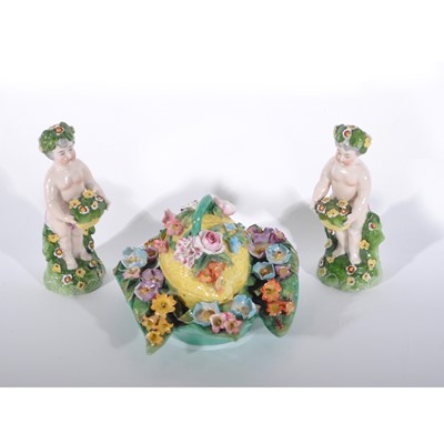 Lot 36 - Pair of Continental porcelain figures of putti