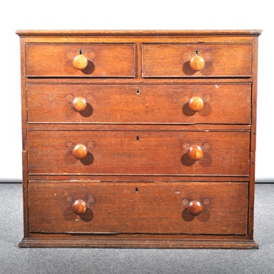 Lot 563 - An old oak chest of drawers